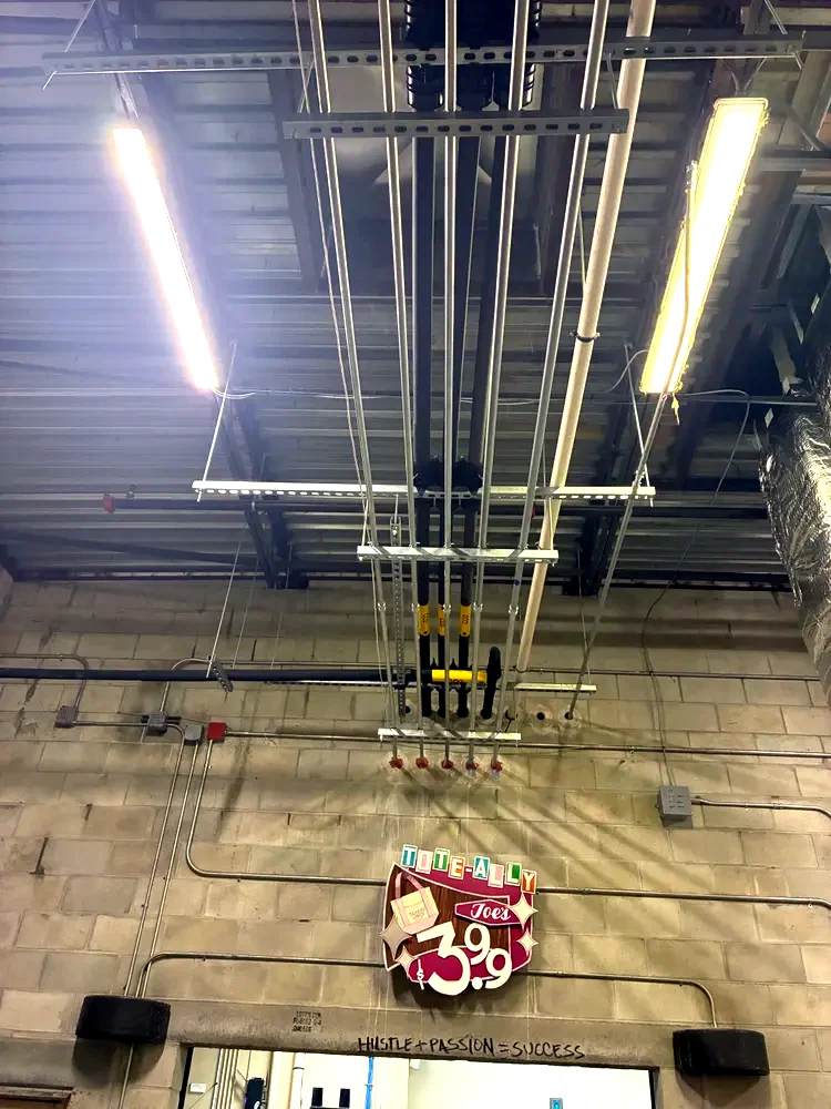 Suspended lighting on an open ceiling - KRW Electric, South Florida